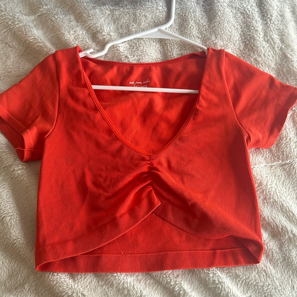 Orange urban outfitters low cut crop top